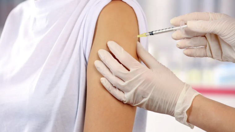 Photo of vaccine being administered into an arm